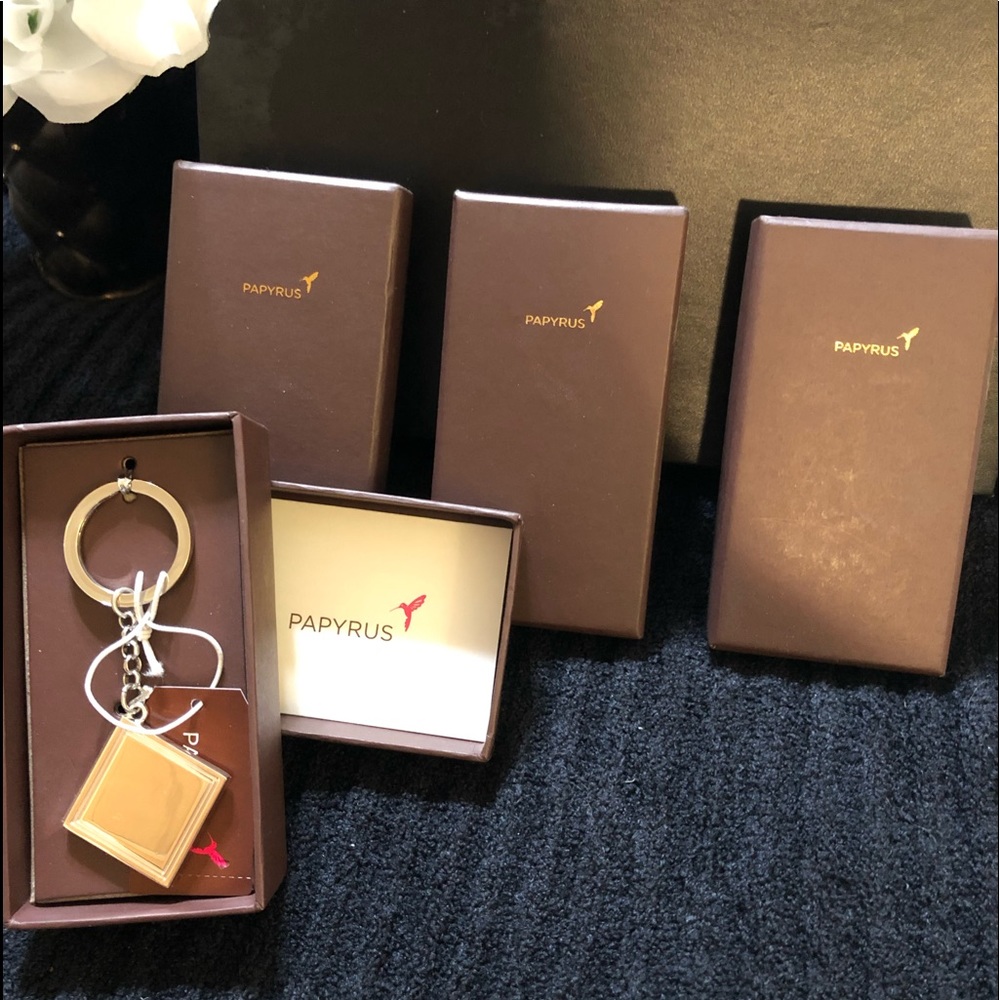 NIB Set of 4 Papyrus Silver Keychains/Charms